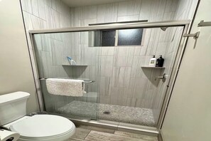 Shower, hair dryer, towels, soap