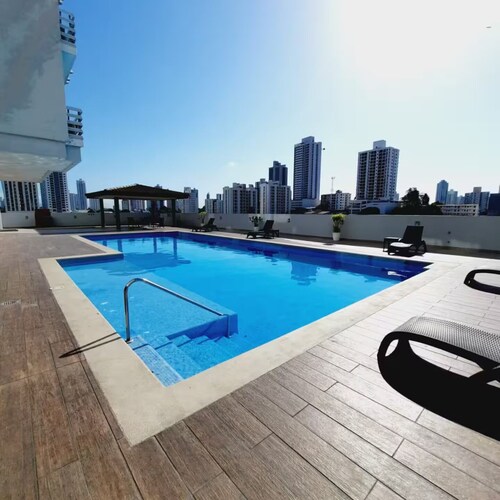 Beautiful apartment with swimming pool, BBQ area, GYM