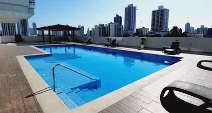 Beautiful apartment with swimming pool, BBQ area, GYM