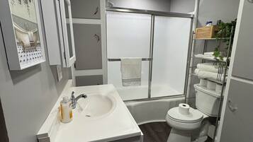 Shower, towels, soap, toilet paper