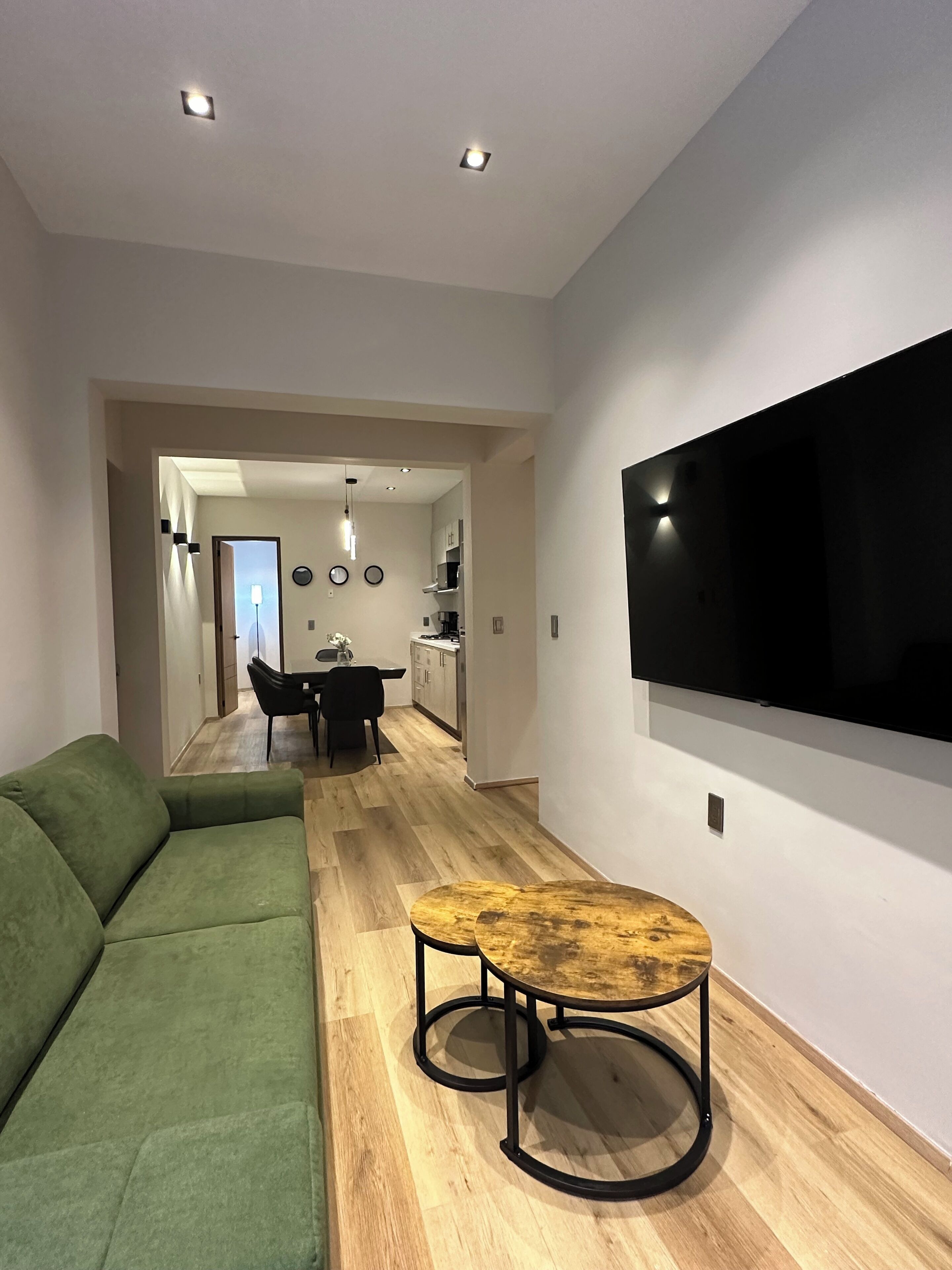 Exclusive Apartment, 2 Bedrooms, City View | Living area | 55-inch LED TV with digital channels