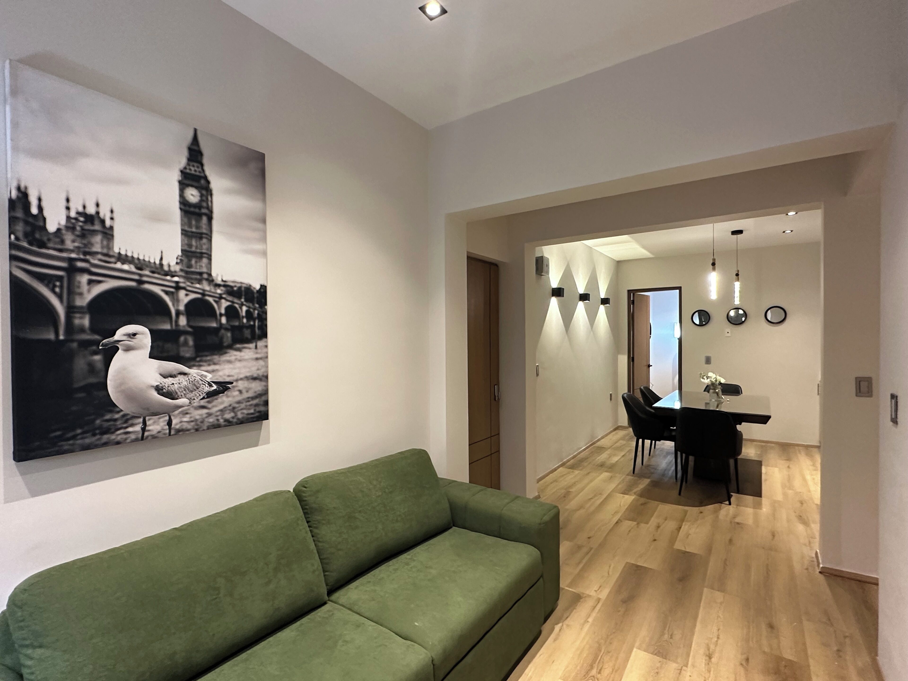 Family Apartment, 2 Bedrooms, City View | Living area | 55-inch LED TV with digital channels