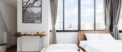 Desk, laptop workspace, blackout curtains, iron/ironing board