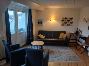 Een smart-tv, videogames en een stereo