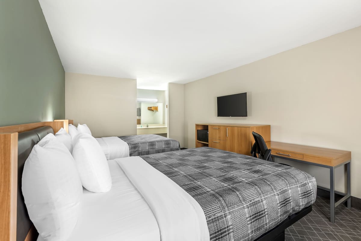 Desk, laptop workspace, free WiFi, bed sheets