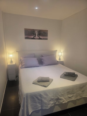 1 chambre, fer et planche Ă repasser, Wi-Fi, draps fournis