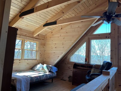 Escape the city at the Cross Mountain Hideaway. A spacious cabin by Luray.