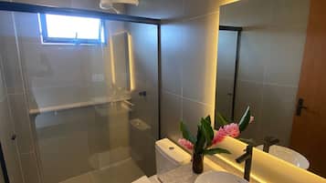 Shower, towels, toilet paper