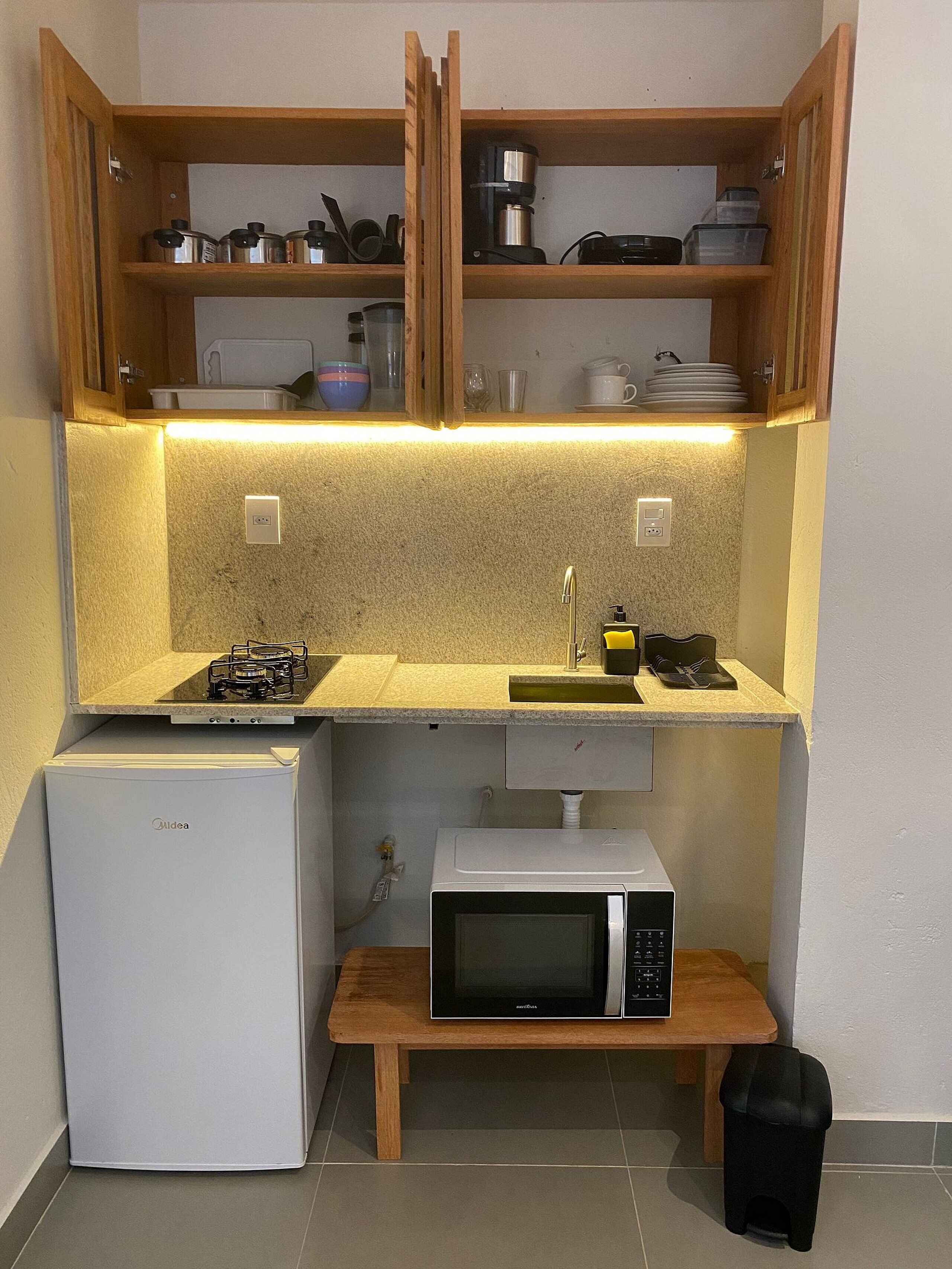 Apartamento | Cozinha privada | Frigobar, fogão, talheres/pratos/utensílios de cozinha