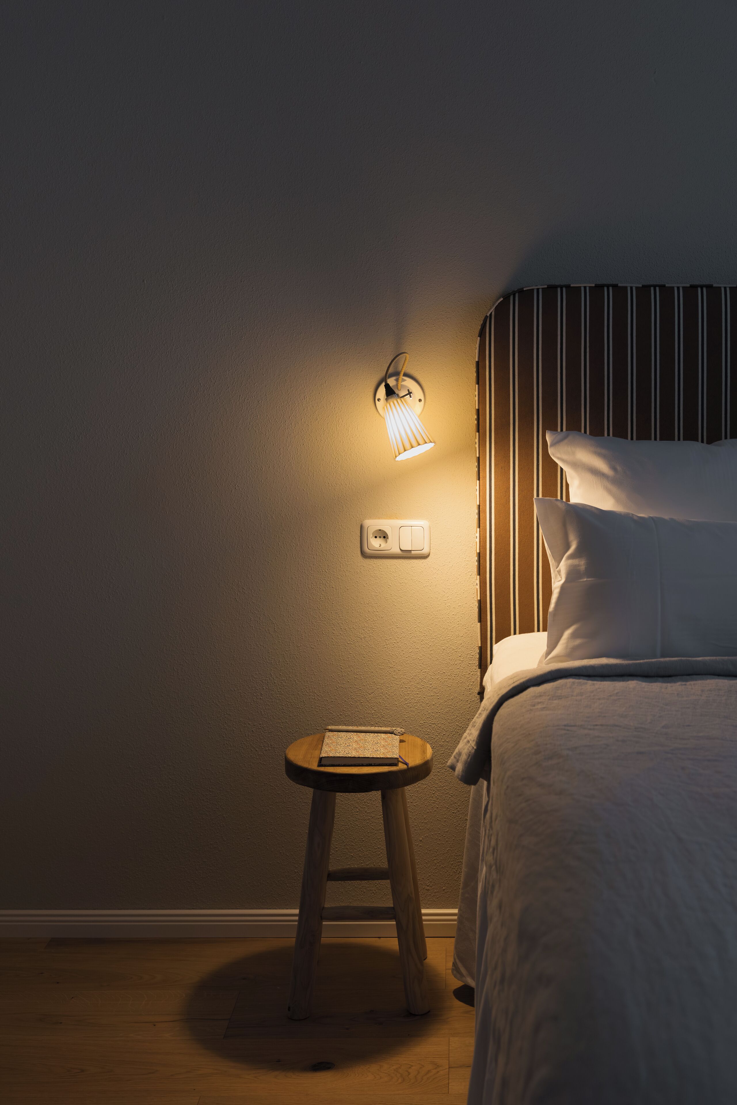 Premium bedding, laptop workspace, blackout drapes, soundproofing