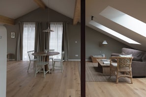 Penthouse Confort | Coin séjour | Station d'accueil iPod