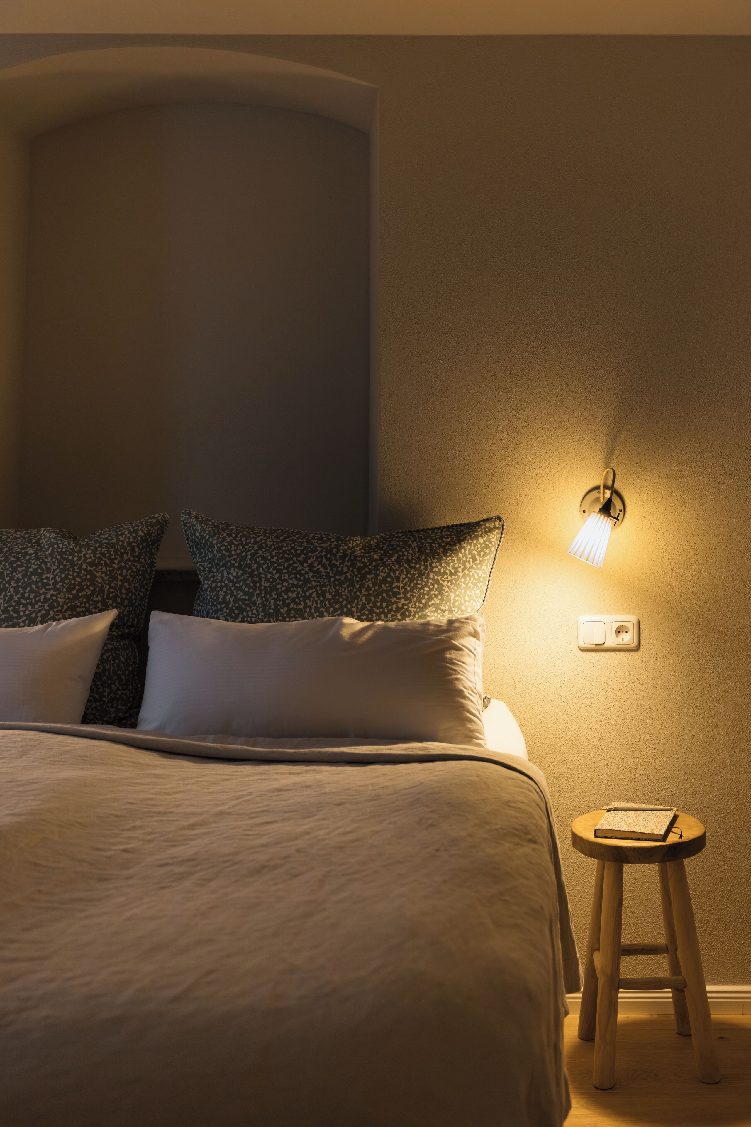 Premium bedding, laptop workspace, blackout drapes, soundproofing