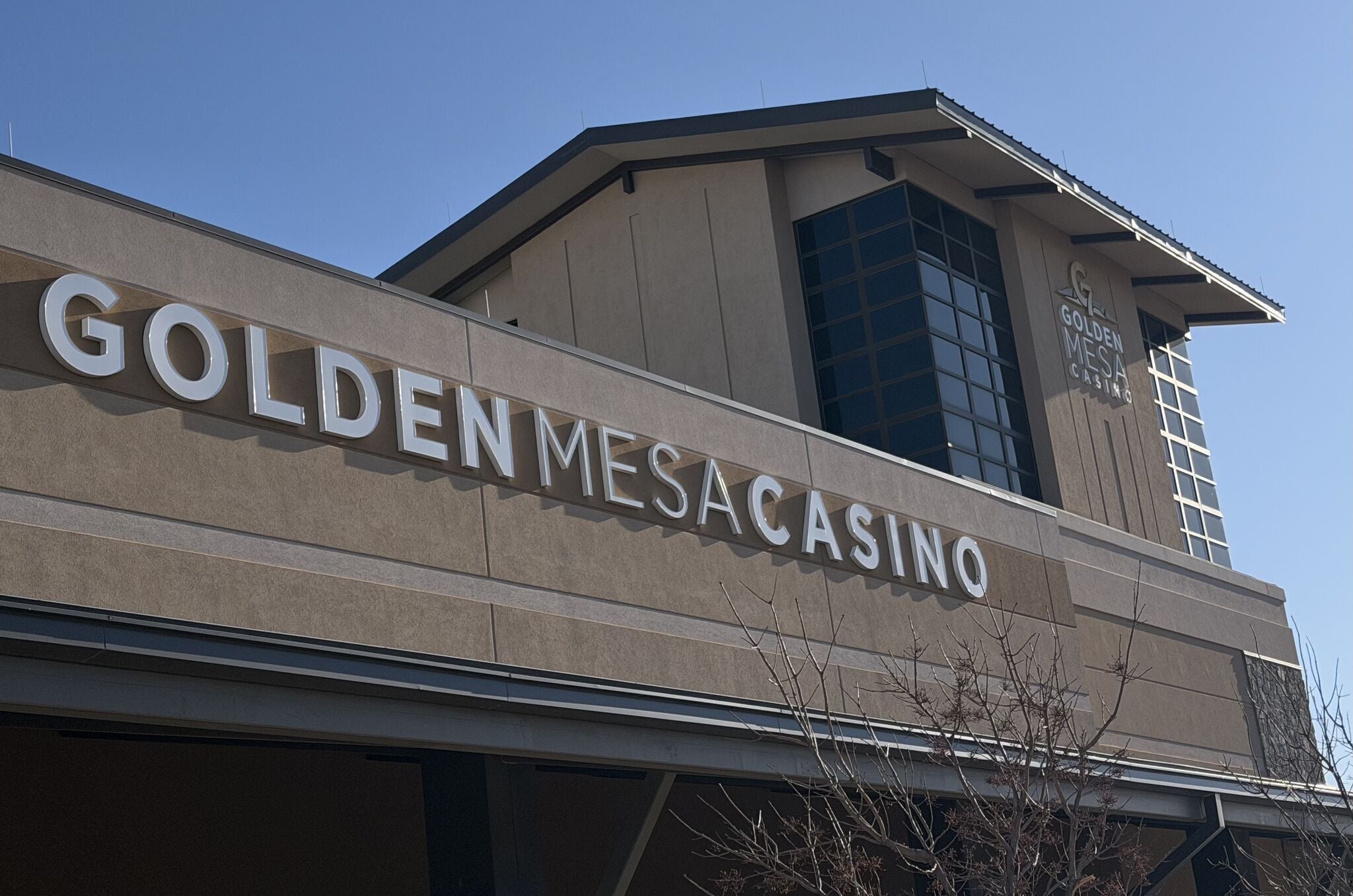 The exterior of the Golden Mesaca Casino with its name prominently displayed on the facade.