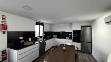 Deluxe Chalet, Ocean View | Shared kitchen | Full-size fridge, microwave, oven, stovetop