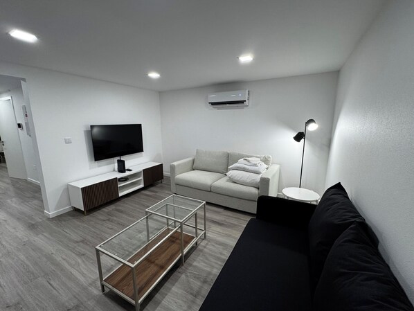 Deluxe chalet, uitzicht op oceaan | Woonruimte