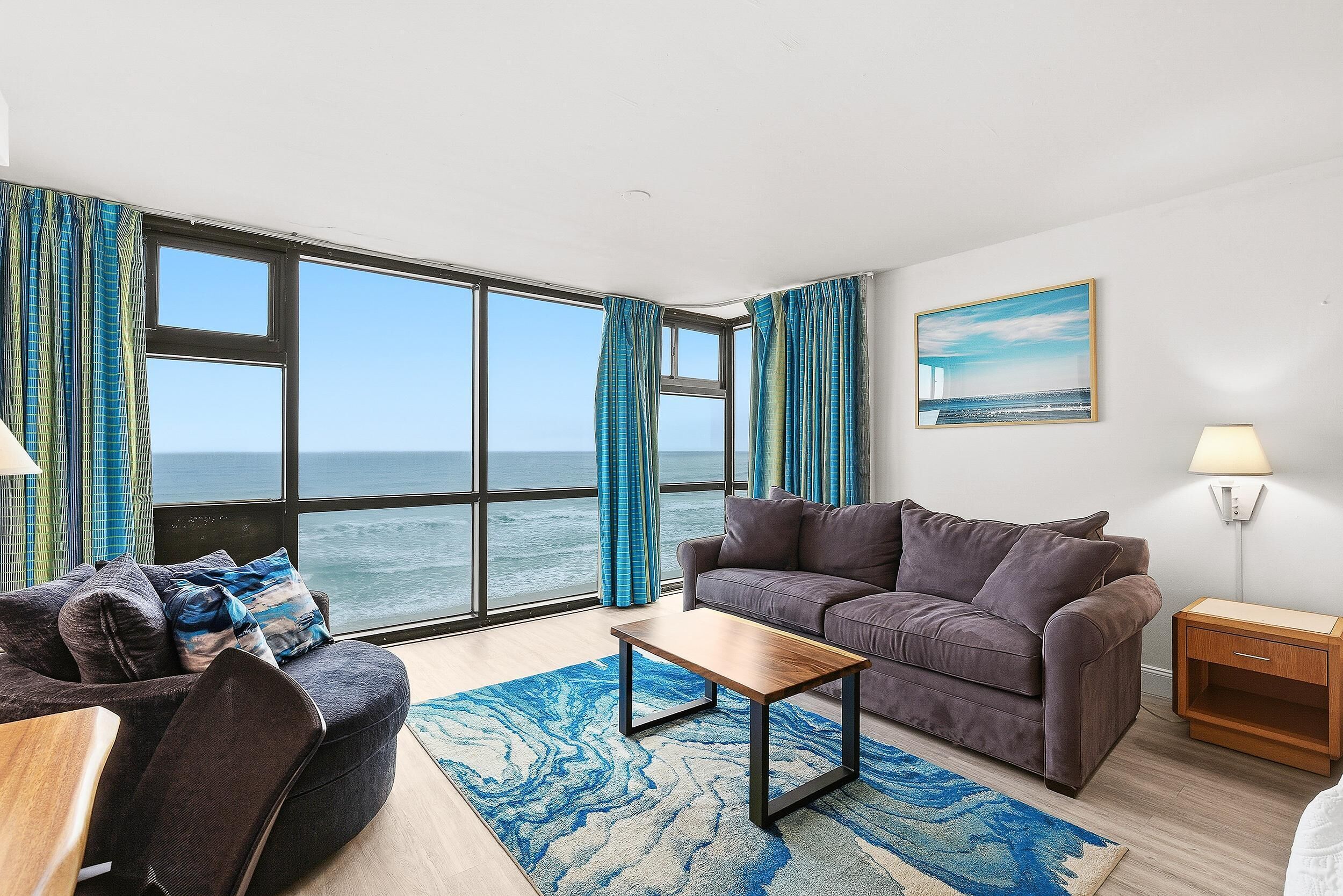 Condo, 1 cama King size y sofá cama (Oceanside Inn 313) | Área de sala de estar