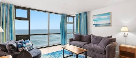 Condo, 1 cama King size y sofá cama (Oceanside Inn 313) | Área de sala de estar