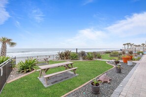 Condo, 1 King Bed with Sofa bed (Oceanside Inn 313) | Outdoor dining - Oceanside Inn 313 (Daytona Beach Shores)