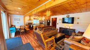 TV, fireplace - Cabin with Dock, Lake and Trail access (Greenville)