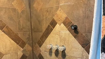 Shower, jetted tub, hair dryer, soap