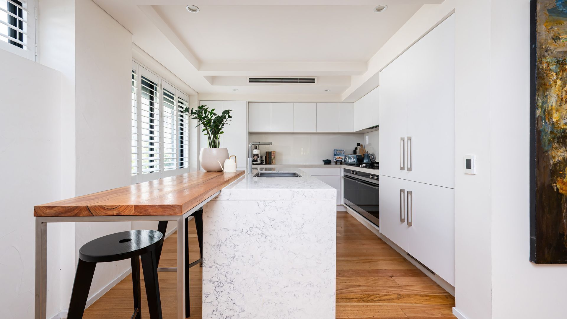 Fridge, stovetop, dishwasher, coffee/tea maker