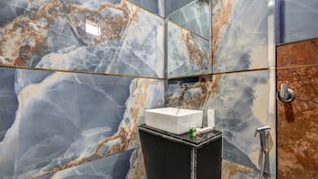 Shower, free toiletries, slippers, towels