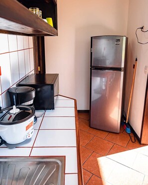 Microwave, stovetop, toaster, cookware/dishes/utensils