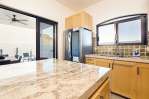 Microwave, oven, stovetop, dishwasher - Luxury Home in Brand New Complex in Cerritos Beach (El Pescadero)