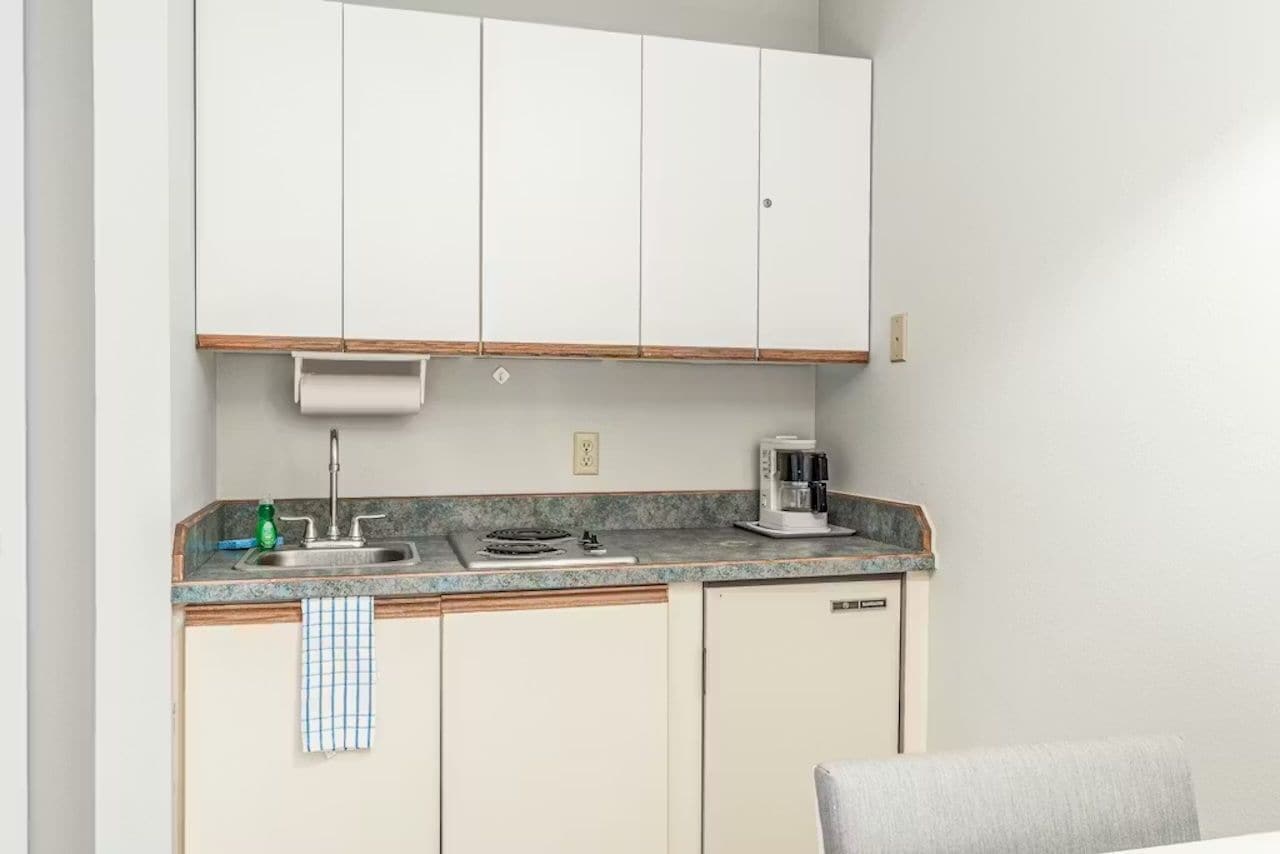 Fridge, microwave, stovetop, coffee/tea maker