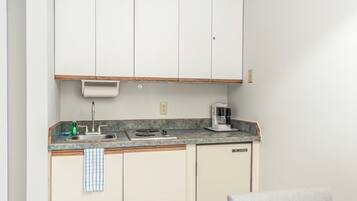 Fridge, microwave, stovetop, coffee/tea maker
