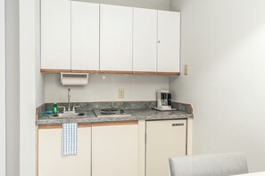 Fridge, microwave, stovetop, coffee/tea maker