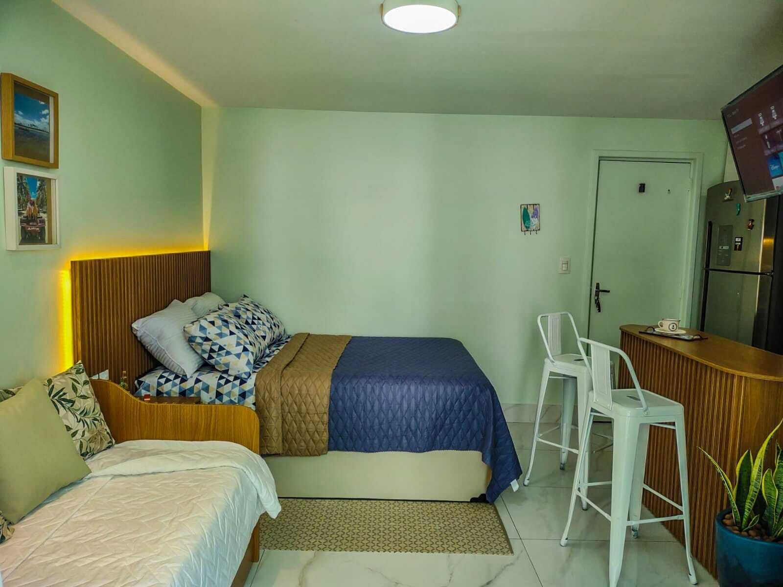 Ferros/tábuas de passar roupa, acesso à internet, roupa de cama