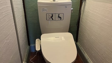 Hair dryer, bidet, towels, soap