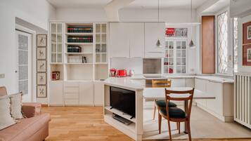 Appartamento, 1 letto queen | Area soggiorno