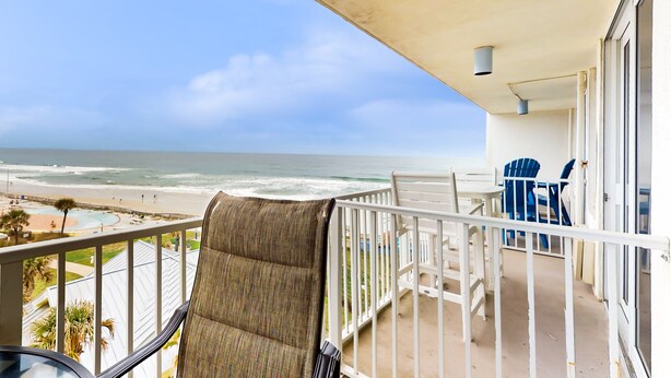 A balcony with a view of the beach and ocean. - Harbour Beach Resort 518 (Daytona Beach)