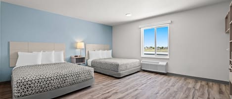 Suite, 2 grands lits, accessible aux personnes à mobilité réduite, non-fumeur | Accès au Wi-Fi (inclus), literie fournie