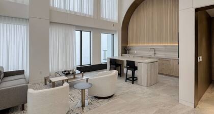 Sun-Drenched Penthouse Retreat with Gym & Parking