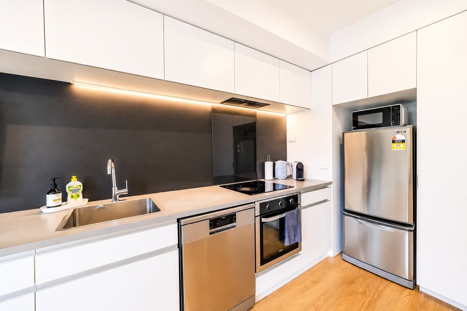 Coffee/tea maker, fridge, microwave, oven