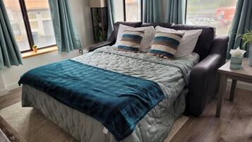 2 chambres, fer et planche à repasser, Wi-Fi, draps fournis