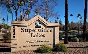 A sign for Superstition Lakes Condominiums, featuring a resort waterfront community. - Superstition Springs Mesa (Mesa)