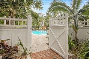 Outdoor pool, a heated pool - Luxury Truman Annex Condo I 3BDR I Pool & Parking I Walk to Duval & Beach (Key West)