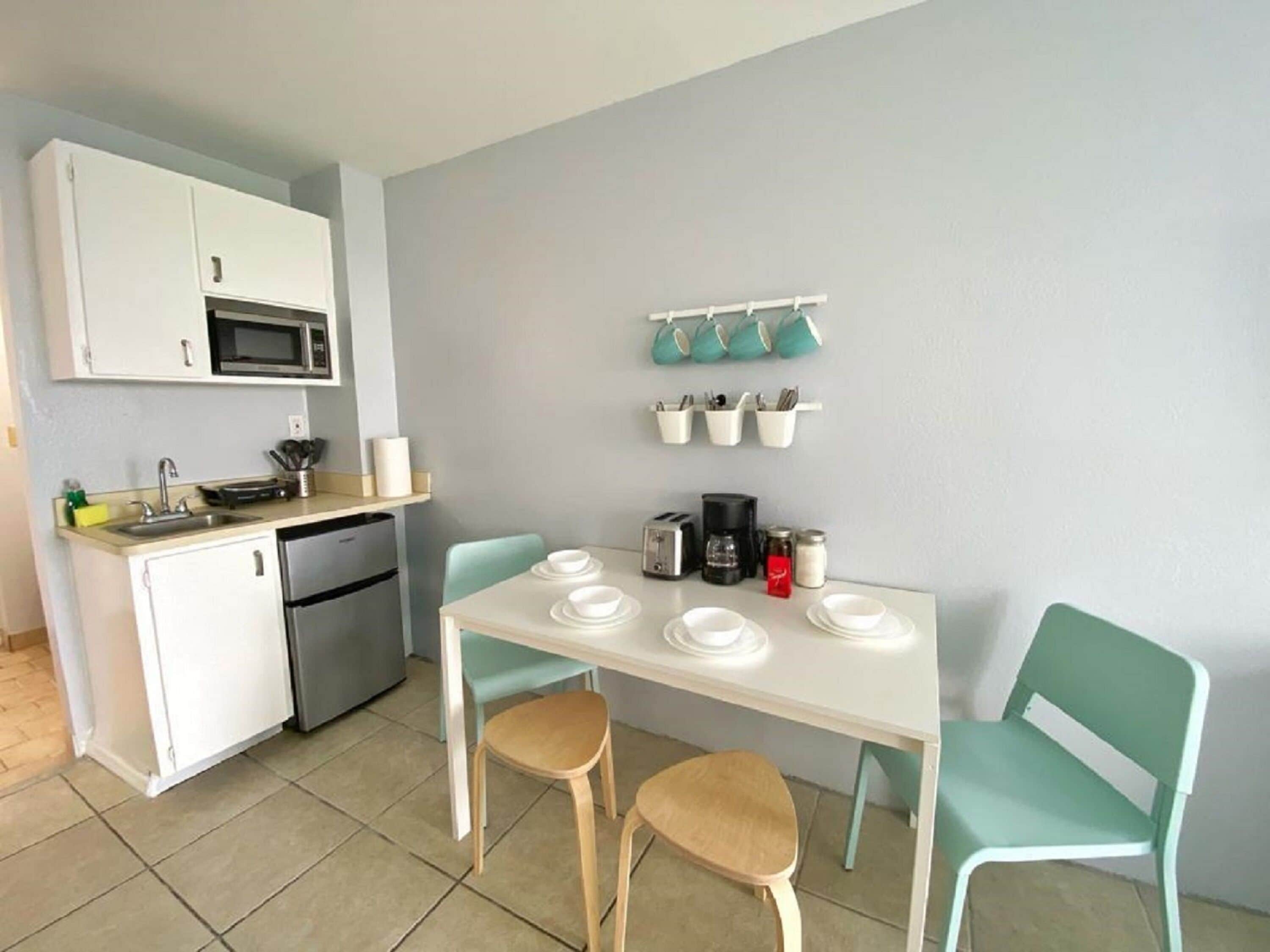 Fridge, microwave, stovetop, coffee/tea maker