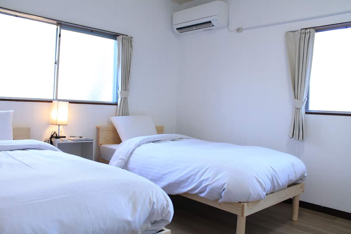 Basic Twin Room, Courtyard View | Laptop workspace, free WiFi