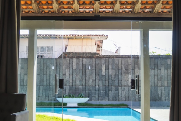 Standard Triple Room, Pool View | View from room