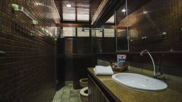 Standard Twin Room | Bathroom | Shower, towels, soap, toilet paper