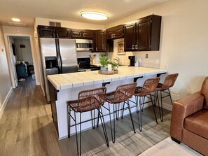 Fridge, microwave, oven, stovetop - The Shandeau: Las Palmas Luxury Condo Overlooking Pools and waterpark.  (St. George)