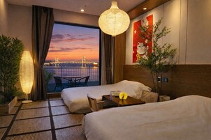 Desk, laptop workspace, blackout curtains, rollaway beds
