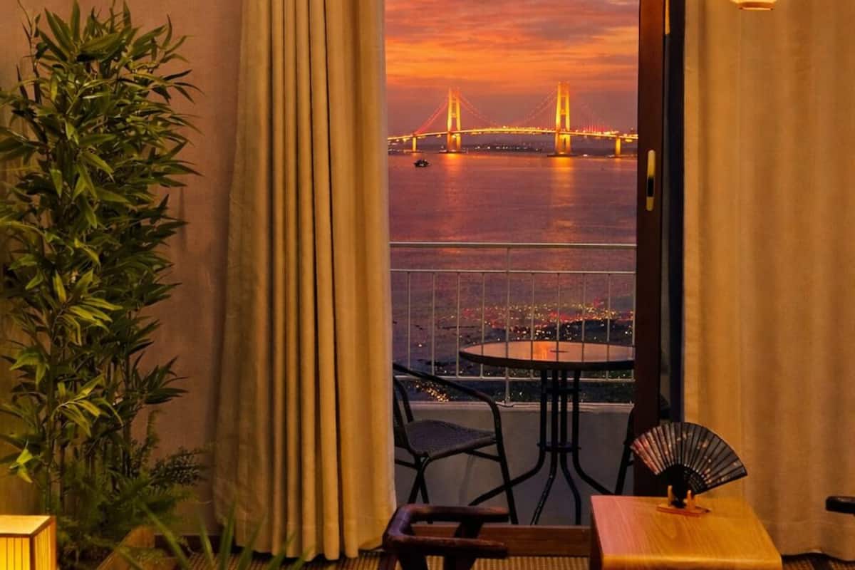 Desk, laptop workspace, blackout drapes, iron/ironing board