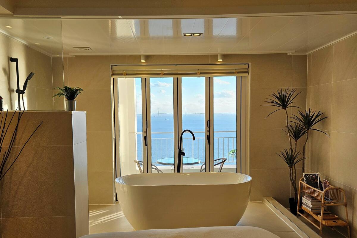 Royal Suite, Sea View | Desk, laptop workspace, blackout drapes, iron/ironing board