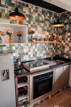 Deluxe Suite, Balcony, Mountain View | Private kitchen | Electric kettle, eco-friendly cleaning products - Hotel Boutique Almaia 17 Near the Airport (Rionegro)